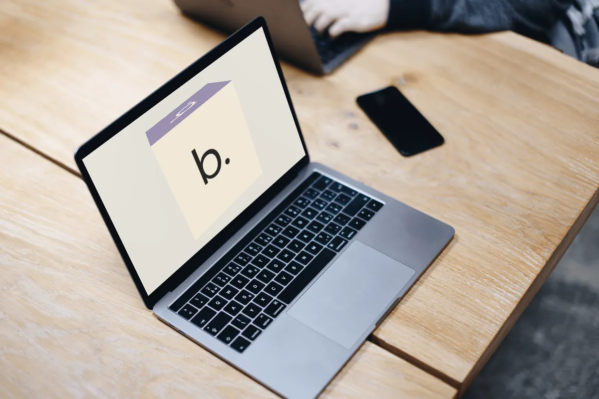 The Block Orbit page in light mode on the same laptop